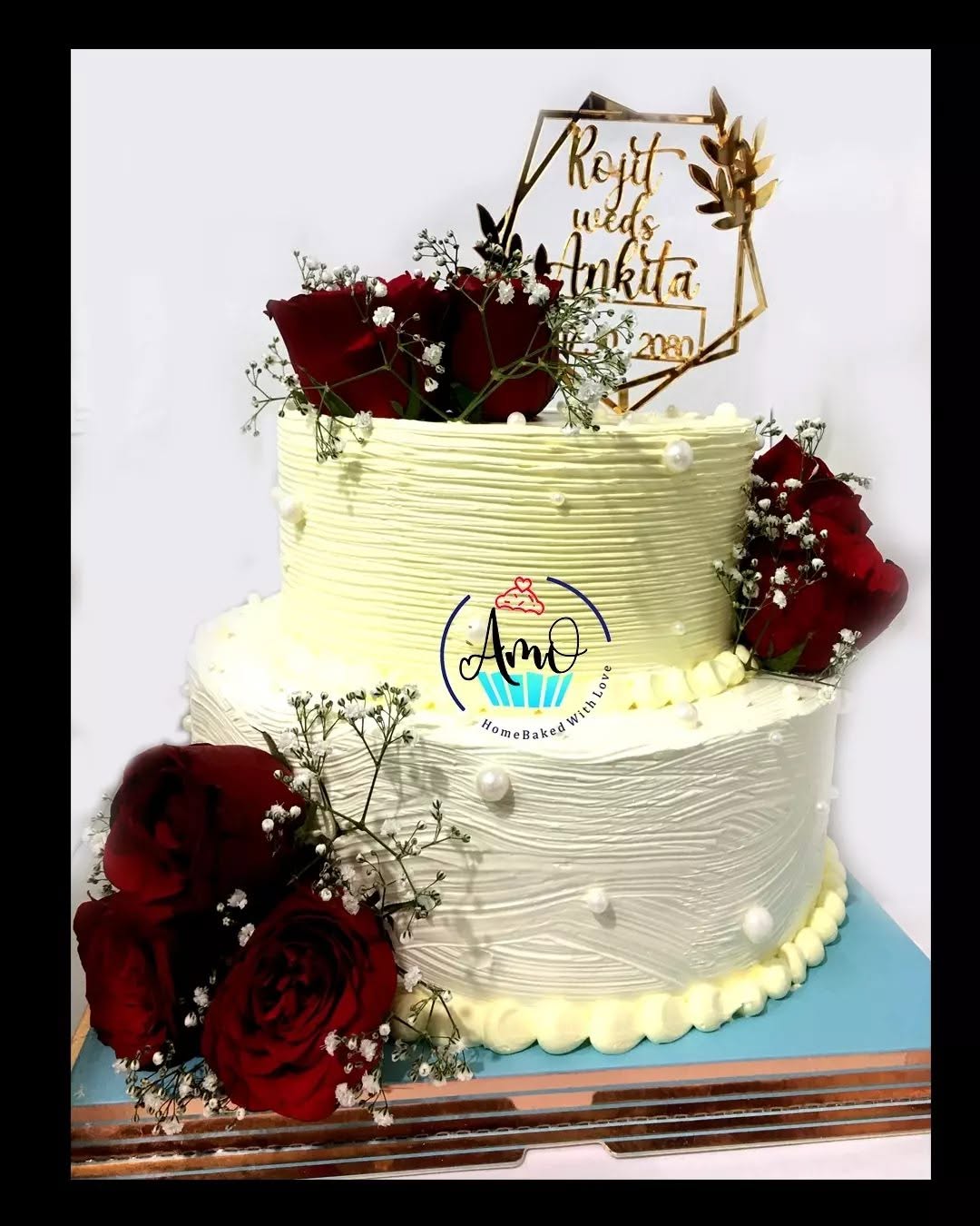 A decorated cake with berries and cream